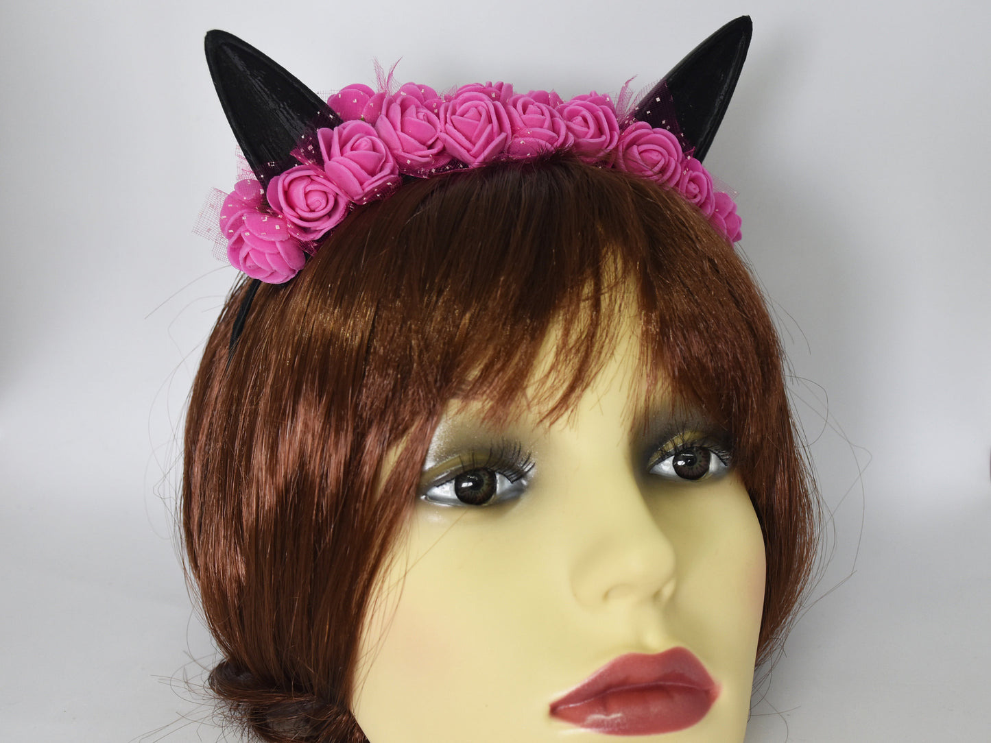 Cute cat ears with pink flowers