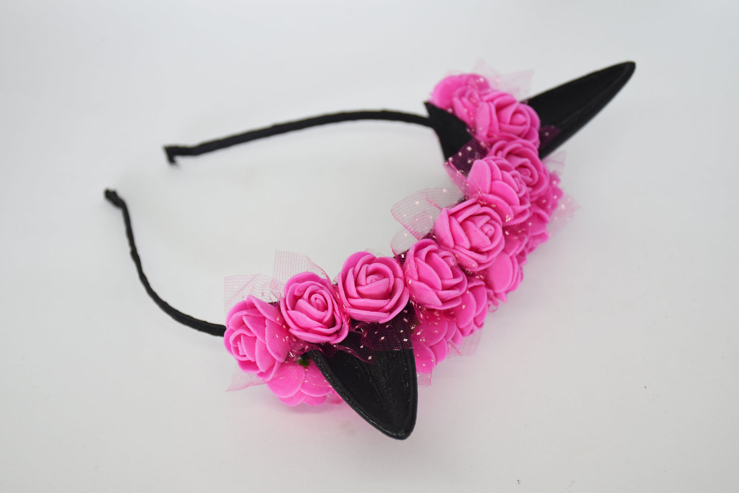 Cute cat ears with pink flowers