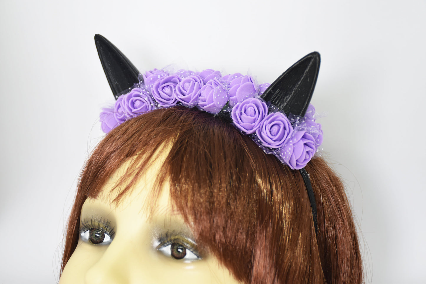 Cute cat ears with purple flowers
