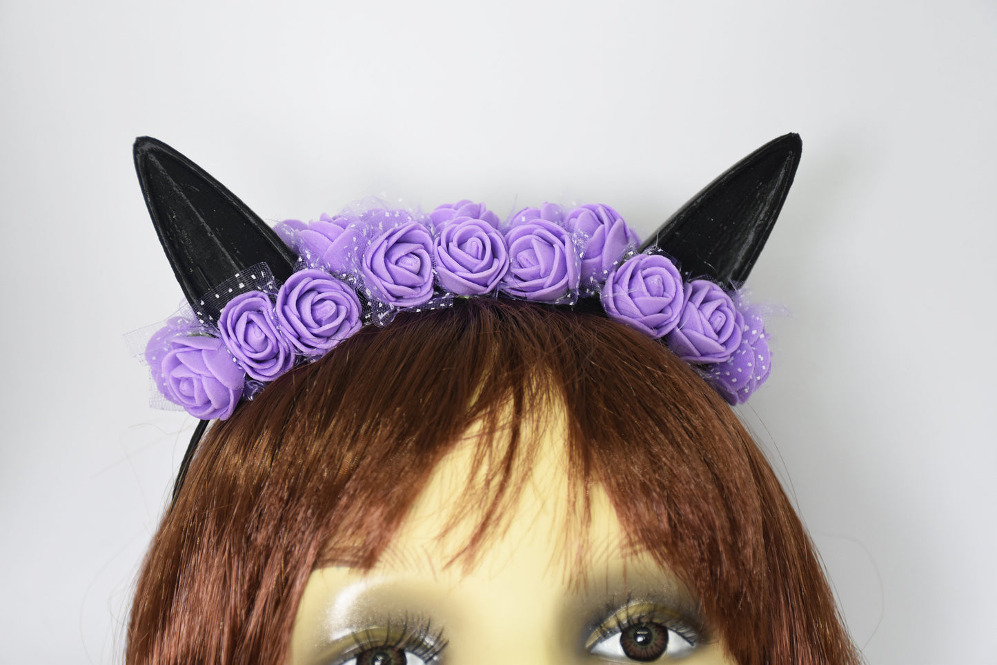 Cute cat ears with purple flowers