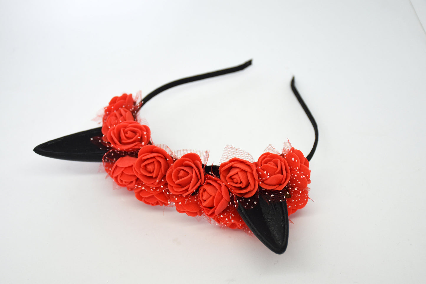 Cute cat ears with red flowers