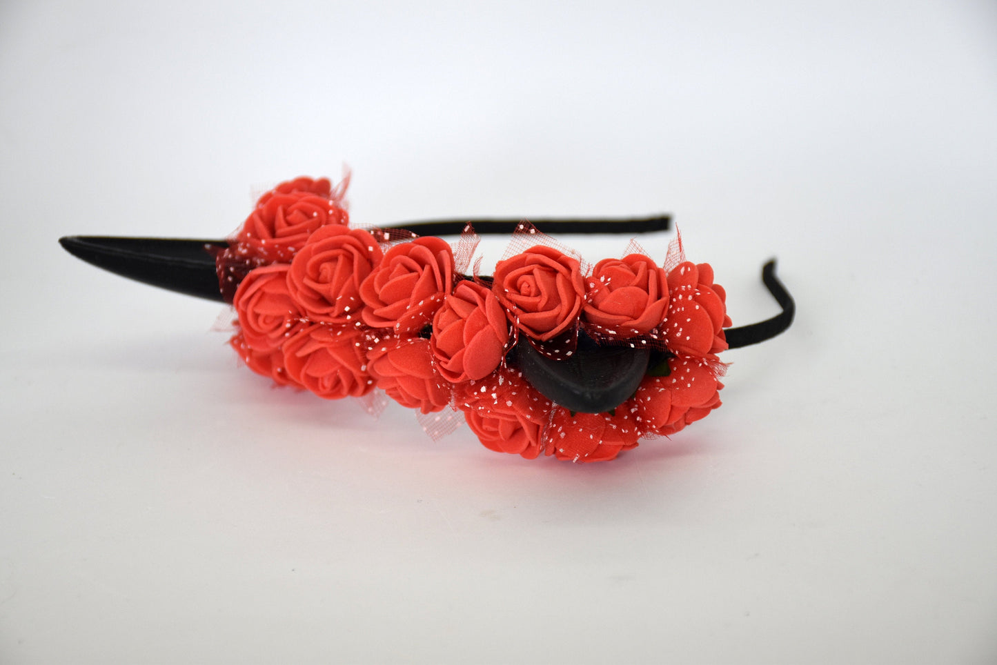 Cute cat ears with red flowers