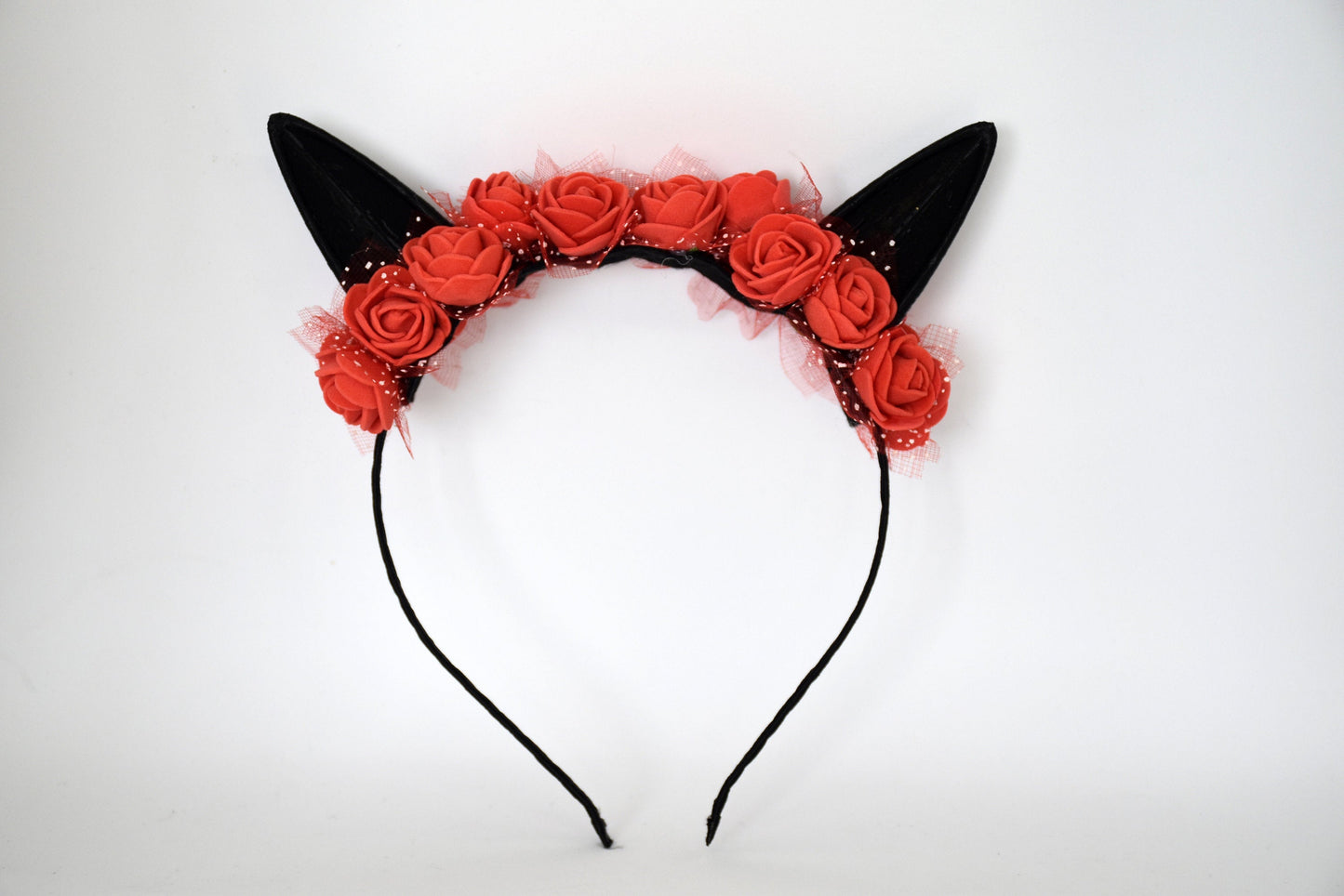 Cute cat ears with red flowers