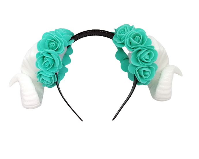 White Ram horns with teal flowers