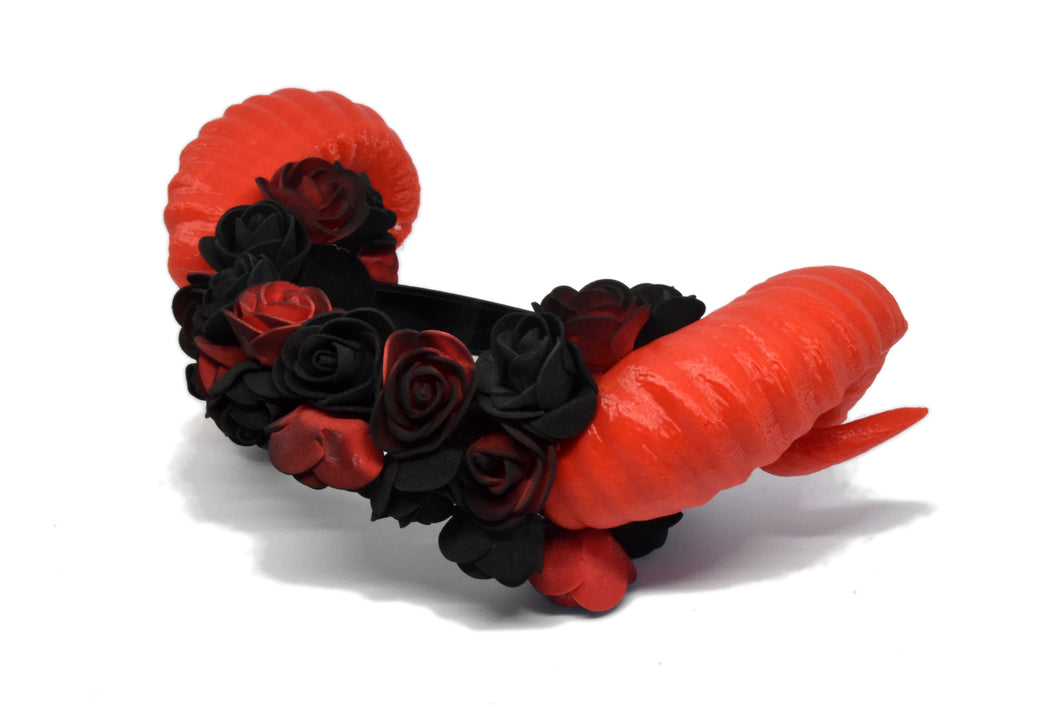 Red Ram horns with red flowers